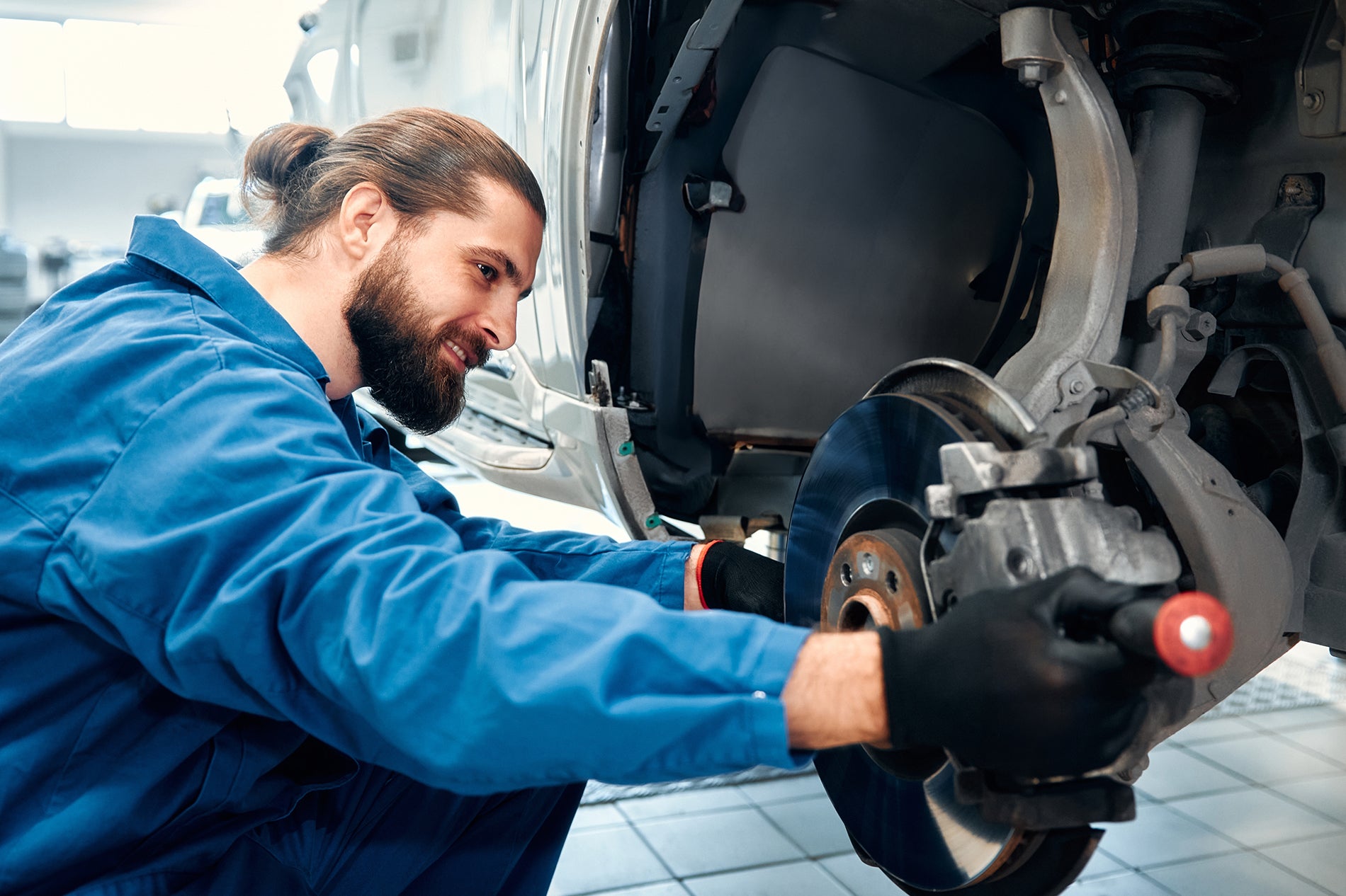 Factory-trained Volkswagen technician performing Atlas brake replacement in Florence, SC